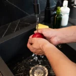 how to tighten kitchen faucet nut under sink